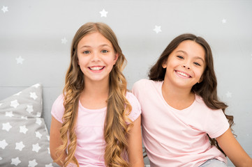 girls children with long curly hair. pajamas party concept. girls just want to have fun. girlish sec
