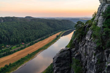  Landscapes of Saxon Switzerland - is the German part of Elbe Sandstone Mountains. Sunset over the valley of the river Elbe.
