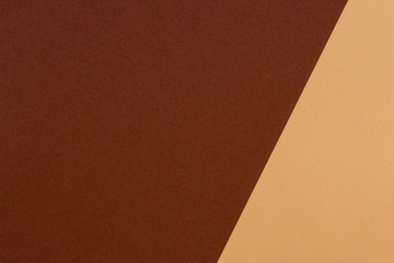 Color papers composition background with beige and brown tones