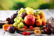 Fresh summer fruits with apple, grapes, berries, pear and apricot