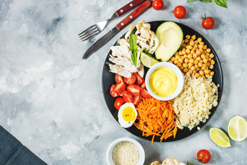 Wall Mural - Healthy vegan lunch bowl on concrete background