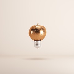 Wall Mural - Copper Old Apple Lightbulb floating on  background. minimal idea concept.
