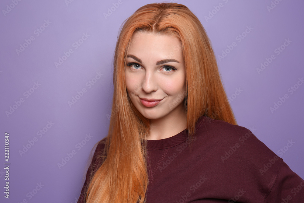 Beautiful young woman on color background