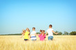 © Pixel-Shot - Cute little children playing in wheat field on sunny day