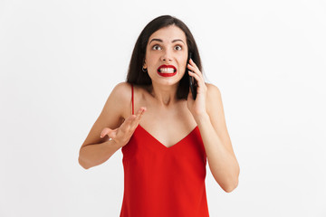 Wall Mural - Portrait of an angry young woman in dress