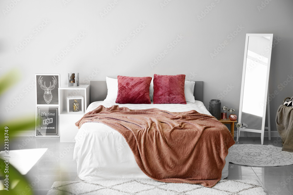 Interior of modern bedroom with big mirror