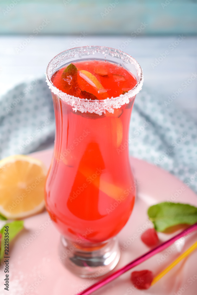 Fresh summer cocktail in glass on plate