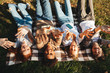 © Drobot Dean - Top view of group of happy multhiethnic students