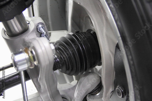 Fotografia, Obraz Automotive transmission parts - close up driveshaft, tripod CV-joint, shock adso