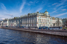 Tourist Buses In Front Of Hermitage Palace And Neva River In Saint Petersburg, Russia.