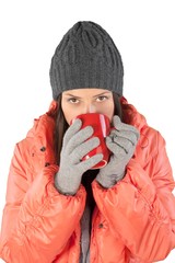 Wall Mural - Pretty young woman holding red cup isolated on white background