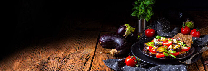 Wall Mural - Eggplant grilled with aromatic feta cheese and tomatoes