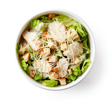 Caesar Salad In Take Away Bowl On White Background; From Above