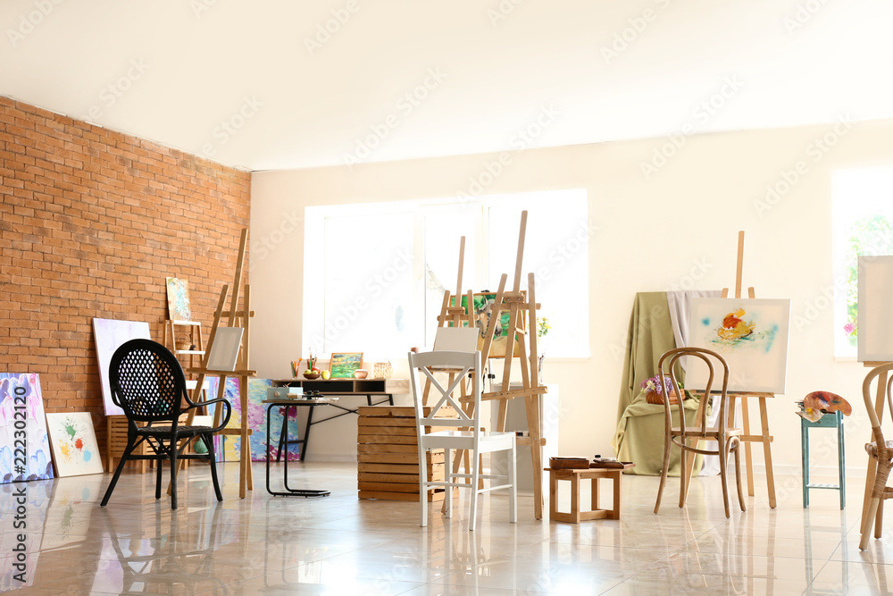 Interior of artist's workshop prepared for painting classes