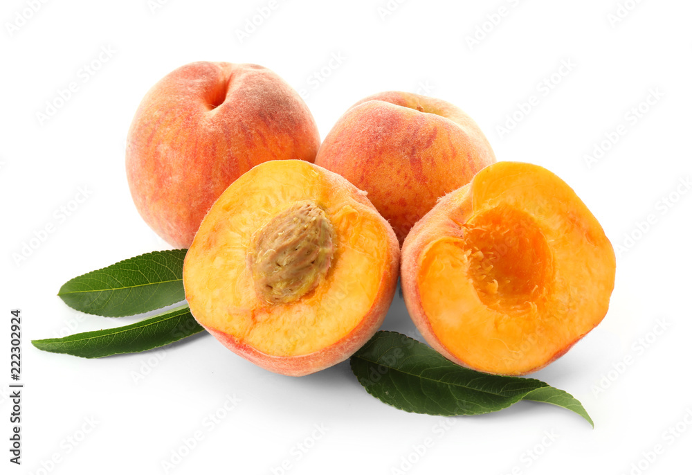 Fresh peaches on white background