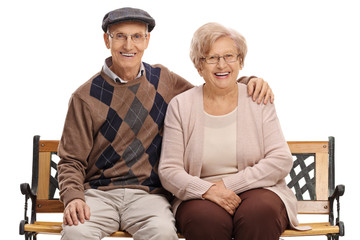 Wall Mural - Mature couple sitting on a bench