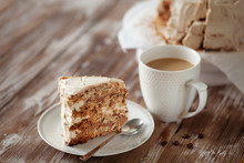 EPiece Of Crispy Coffee And Nut Meringue Cake With Butter Cream Frosting