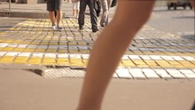 Pedestrian Crossing In The Modern City. Pedestrians Slow Motion Video. People In The City Moscow On The Red Square Concept Travel City Lifestyle