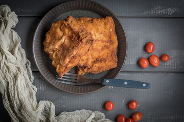 Two fried cod fillet pieces.