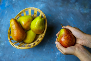 pear on a blue table