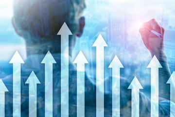 Up arrow graph on skyscraper background. Invesment and financial growth concept.