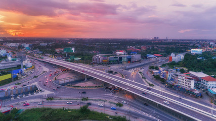 Wall Mural - Highway road intersection at dusk for transportation, distribution or traffic background.