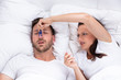 Woman Trying To Stop Man's Snoring With Clothespin