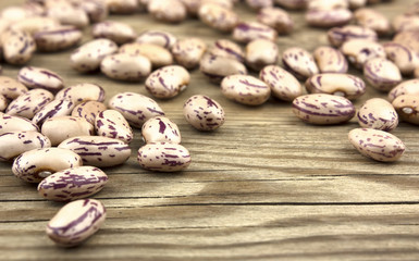 Haricot beans on wooden background, beans background