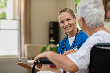 Sticker - Friendly nurse talking to senior patient