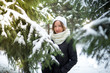 © allenkayaa - Portrait of a young woman in a winter forest near a spruce