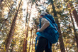 © Novak - Woman Traveler Backpack Enjoying View Forest