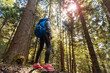 © Novak - Woman Traveler Backpack Enjoying View Forest