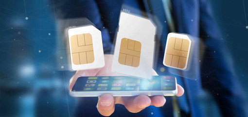 Poster - businessman holding different size of a smartphone sim card 3d rendering