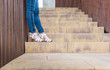 © ADDICTIVE STOCK - Teen girl with white shoes with wide heels