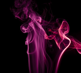 Purple smoke on black background