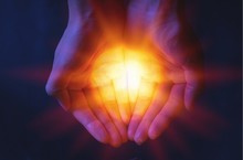 Human Hands Holding Flash Light On Background