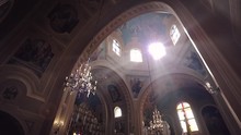 A Ray Of Light Through The Chandelier In The Cathedral
