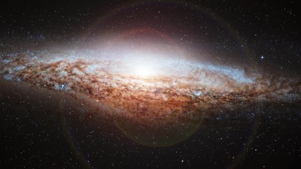Wall Mural - Space travel to Ufo galaxy, slow rotating in outer space with bright flare light at center. Contains public domain image by NASA