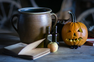 Still life with pumpkin face on halloween in october