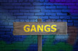 Gangs sign on graffiti wall background