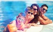 © BillionPhotos.com - Happy family playing in swimming pool