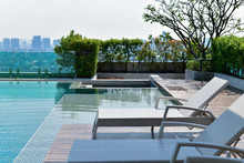 Swimming Pool On Roof Top With Beautiful City View At Bangkok, Thailand.