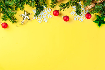 christmas holiday festive background with pine cones, xmas tree branches, gifts boxes and decoration