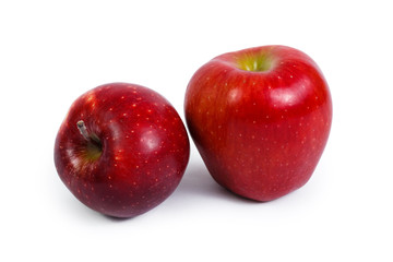 Two red apples on a white background