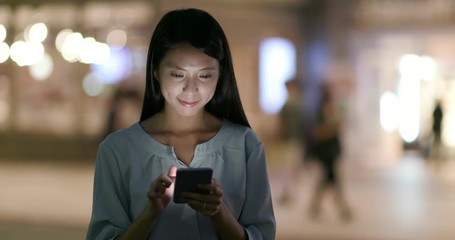 Poster - Woman use of smart phone in city