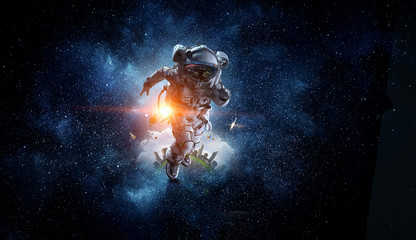 Wall Mural - Spaceman running fast. Mixed media