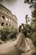 © BGStock72 - Wedding couple near  Colosseum in Rome, Italy