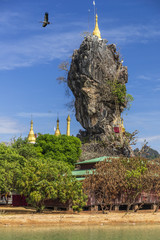 Wall Mural - Amazing Buddhist Kyauk Kalap Pagoda under blue sky, Hpa-An