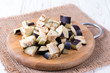 © qwartm - Eggplant cubes on a cutting board