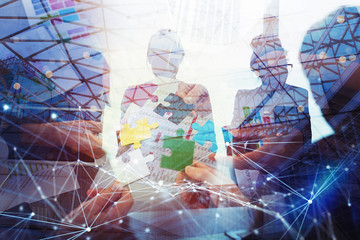 Business people work together in office. Concept of teamwork and partnership. double exposure